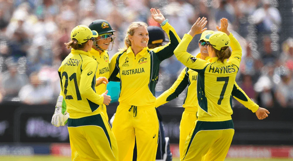 Australian Women's Cricket Team in action on the field.