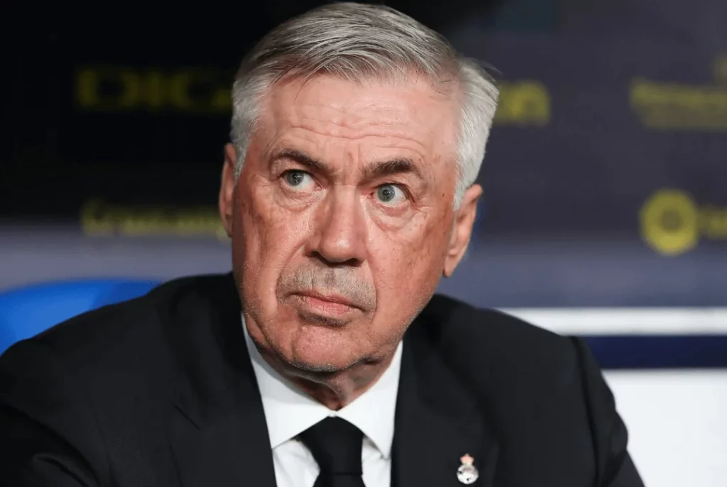 Ancelotti, the Real Madrid manager, deep in thought during a match.