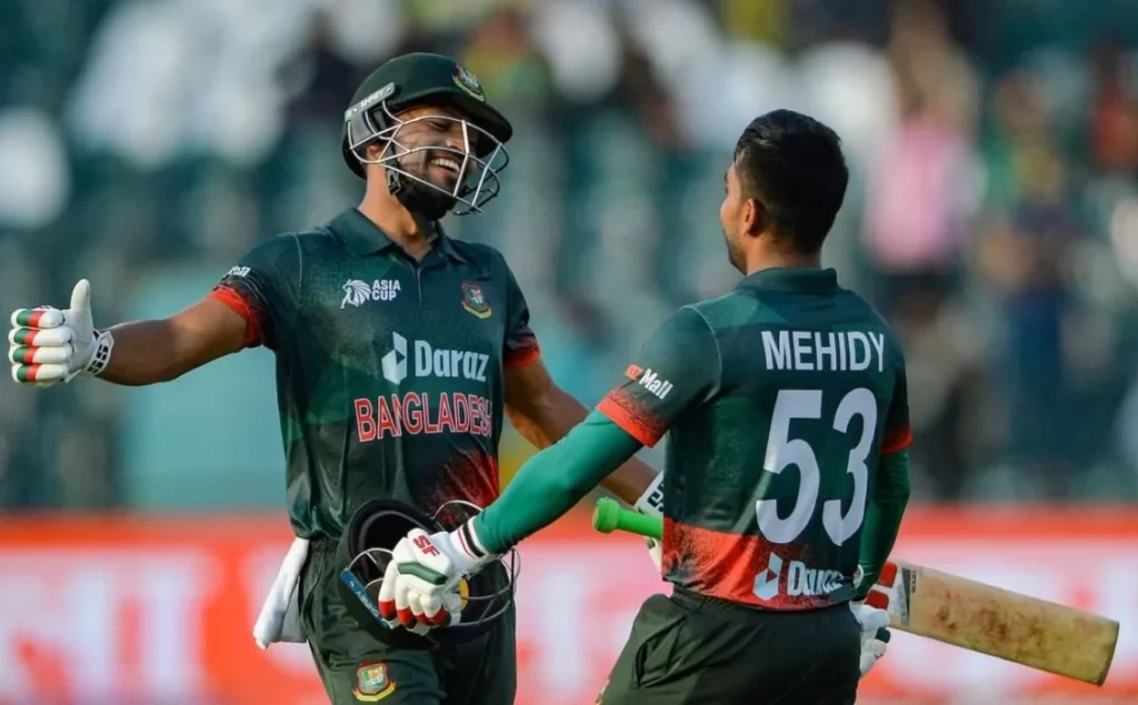Bangladeshi cricket team players celebrating a victory.