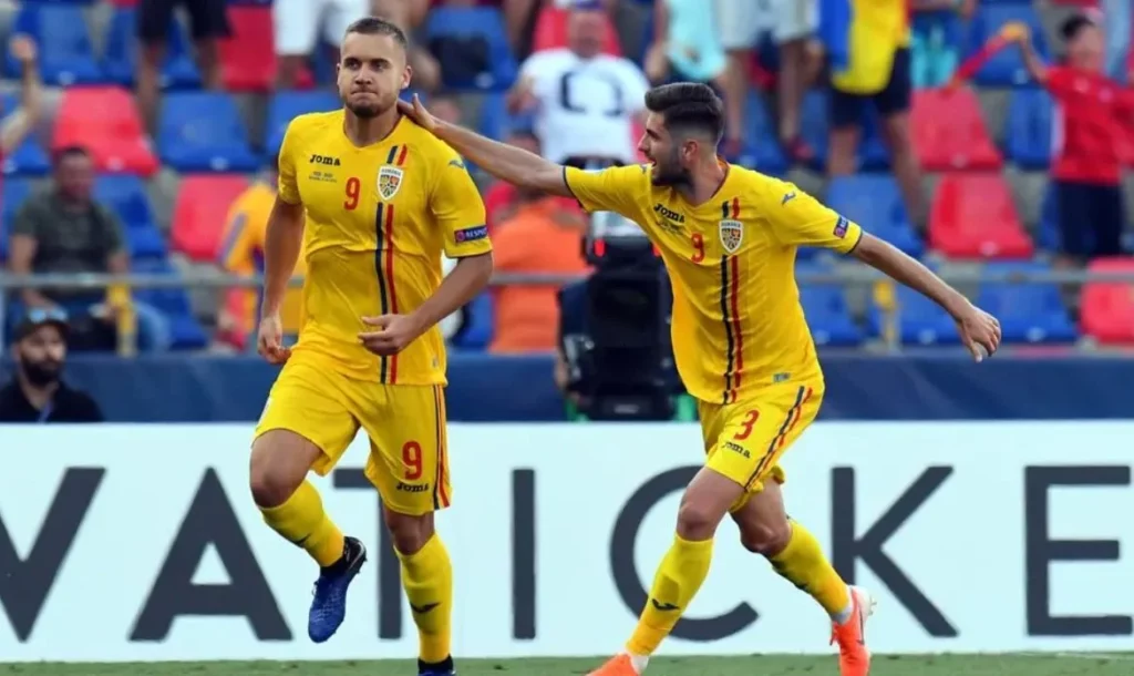 Forward George Puscas (on the left) is set to lead Romania in their quest for victory against Israel.