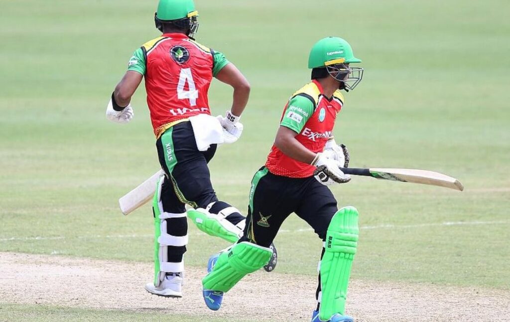 Guyana Amazon Warriors players in action during match.