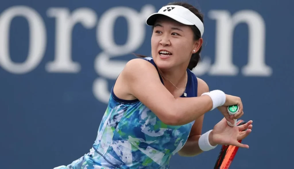 Zhu Lin in action during a tennis match.