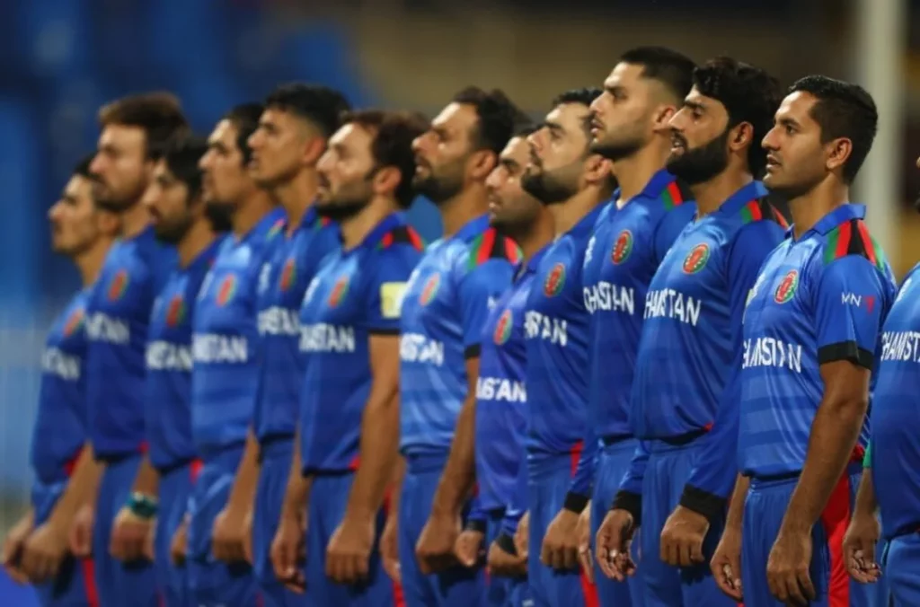 Afghanistan cricketers preparing for their next game on the field.