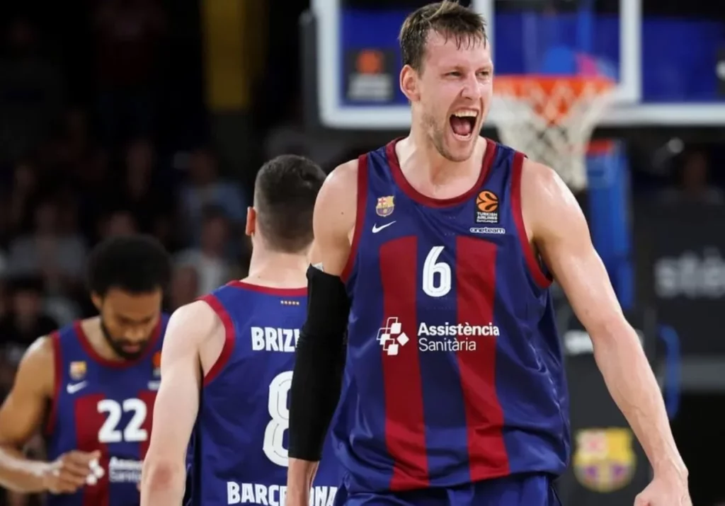 Barcelona basketballer expressing joy during the game.