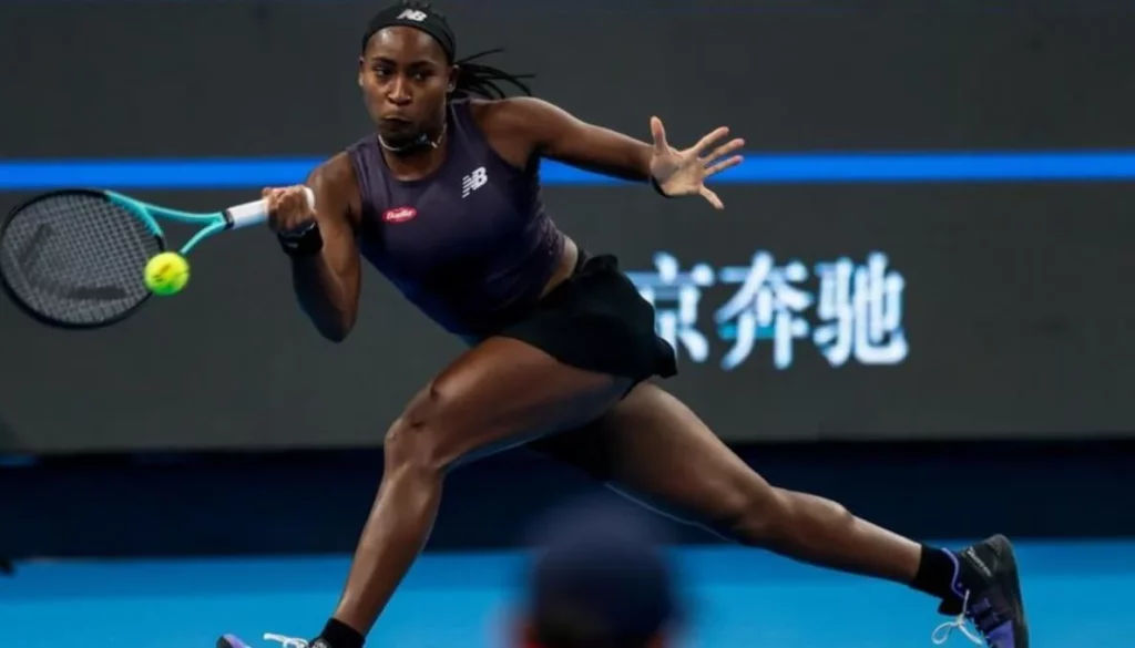 Coco Gauff's powerful forehand swing captured in action.