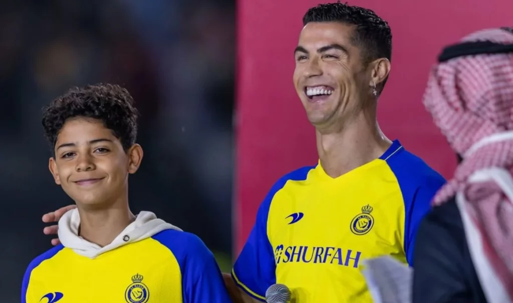 Ronaldo Sr and Jr smiling during a public appearance.