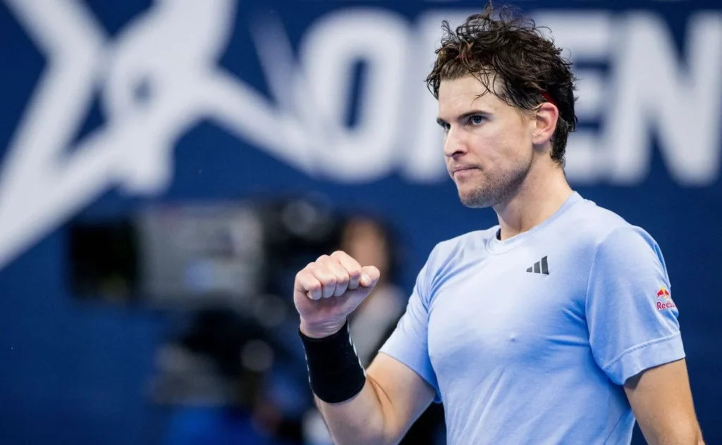 Thiem's exhilaration captured as he lifts his fist after a crucial point.
