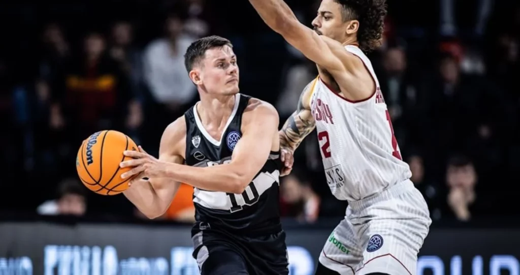 Elvar Mar Fridriksson in action during a basketball game.