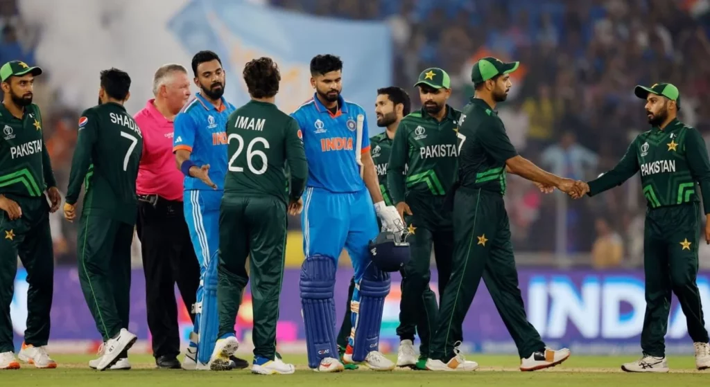 Indian and Pakistani cricketers post-match handshake.