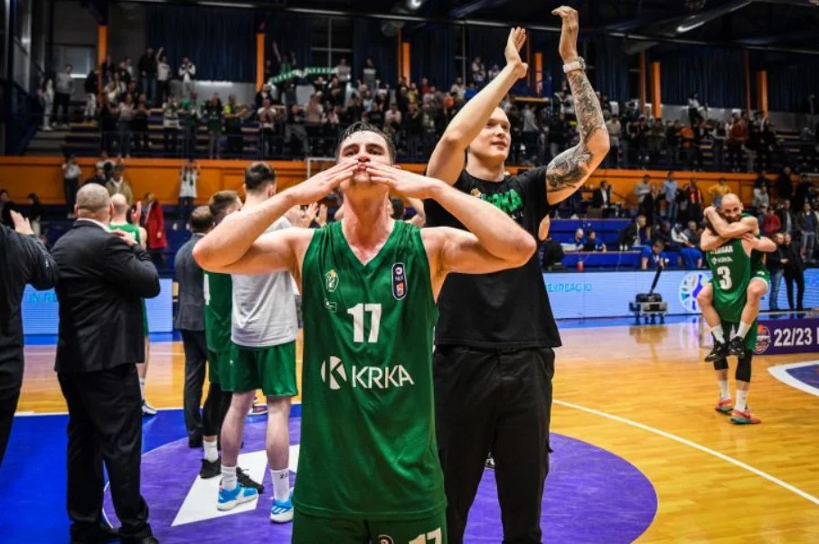 Krka basketball players celebrating after a victory.