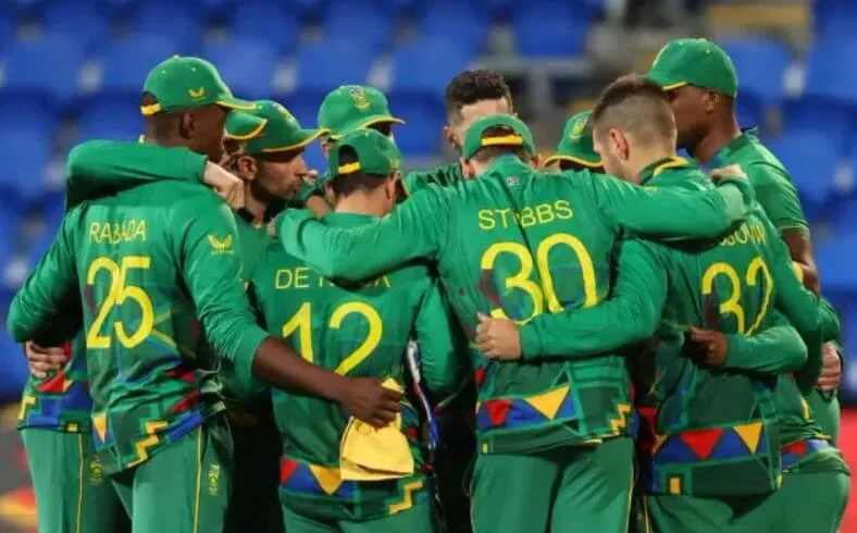 Team South Africa strategizing during a cricket match.
