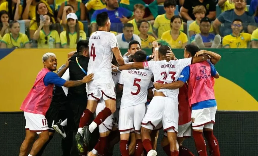 Venezuelan players celebrating a scored goal.