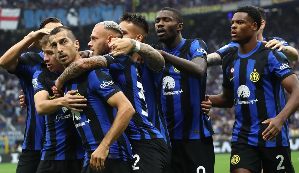 Joyous moment for Inter Milan footballers after scoring a goal.