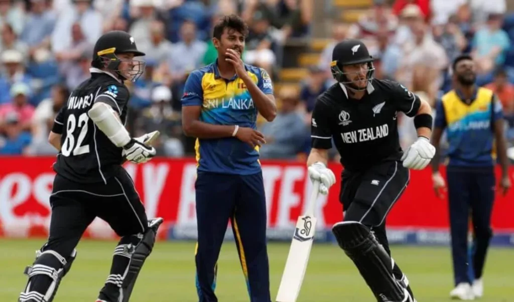 Cricket players in intense action at the New Zealand vs Sri Lanka game.
