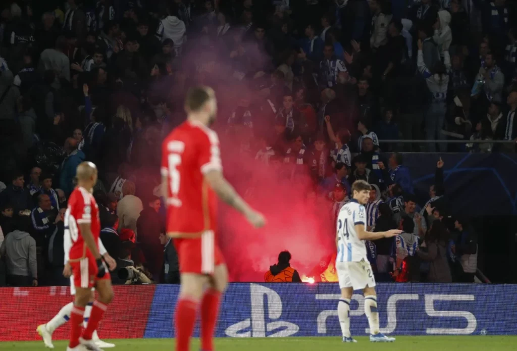 Flares being thrown at the Reale Arena during the Real Sociedad-Benfica match.