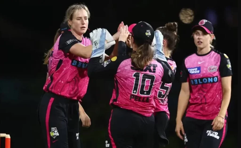 Sydney Sixers women's cricket team in action during a WBBL match.