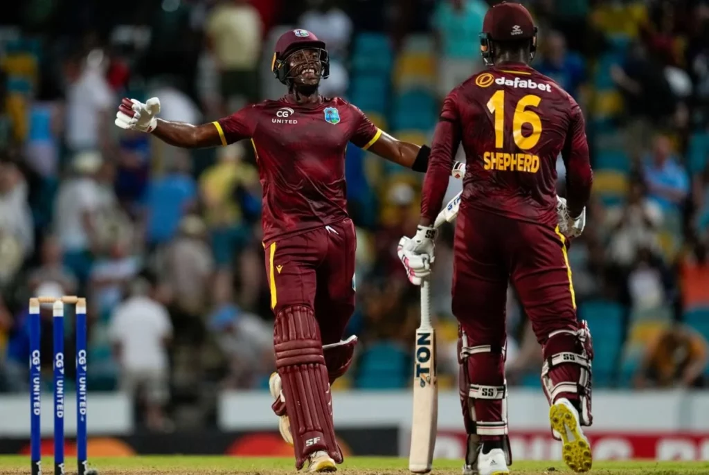 Joyous West Indies players rejoicing after a game win.