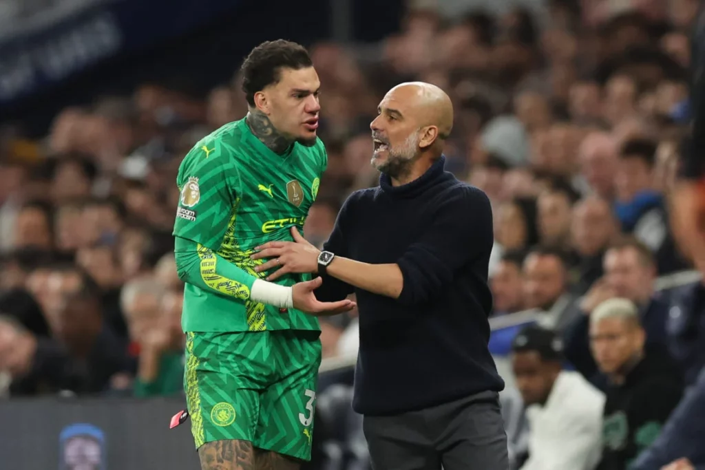 Ederson and Pep Guardiola